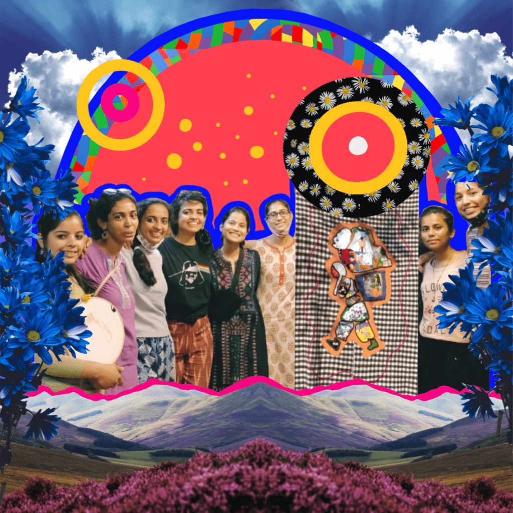 Eight women are standing together and looking at the camra. Also included is a piece of embroidery+painting on a traditional garadi that was a part of the group's Pahada da Lan exhibition! In the backdrop are illustrations of blue and magenta flowers, mountains, clouds and circular colorful patterns